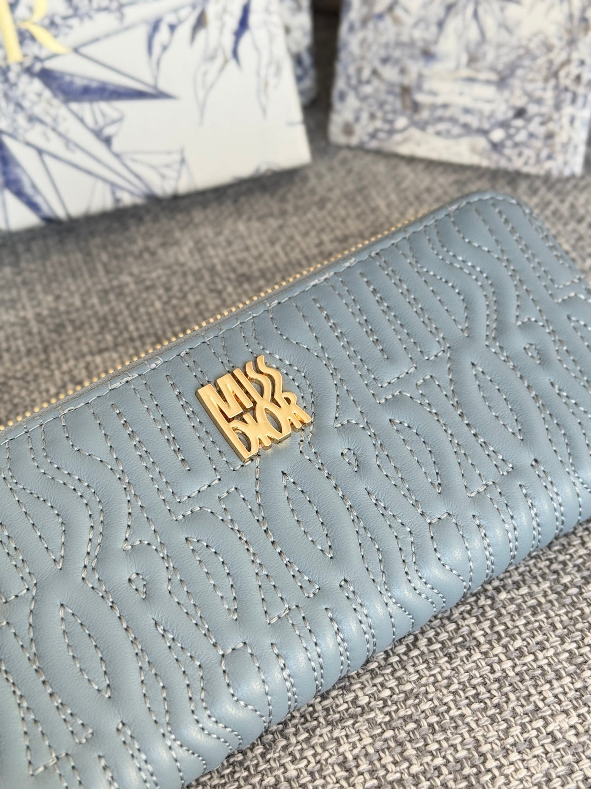 DIOR VERTICAL LONG ZIP WALLET 20 IN BABY BLUE QUILTED ALLOVER CALFSKIN